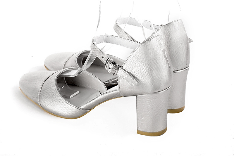 Light silver women's open side shoes, with an instep strap. Round toe. Medium block heels. Rear view - Florence KOOIJMAN